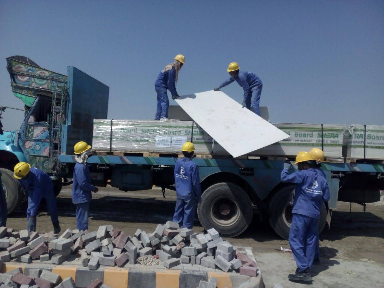Panels being offloaded on site